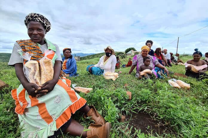 ladies sitting in agricultural field