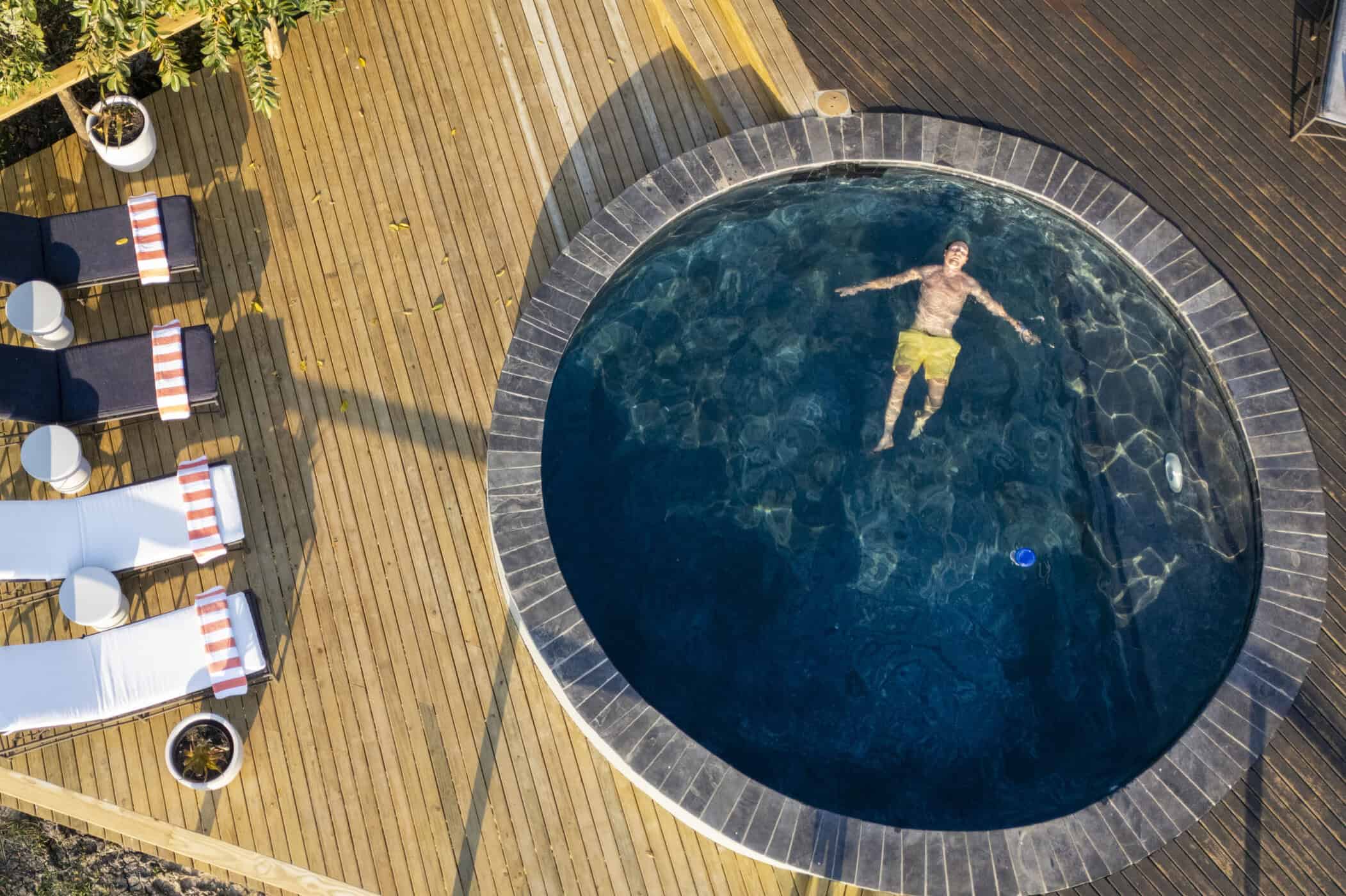 aerial photo of swimming pool with guest