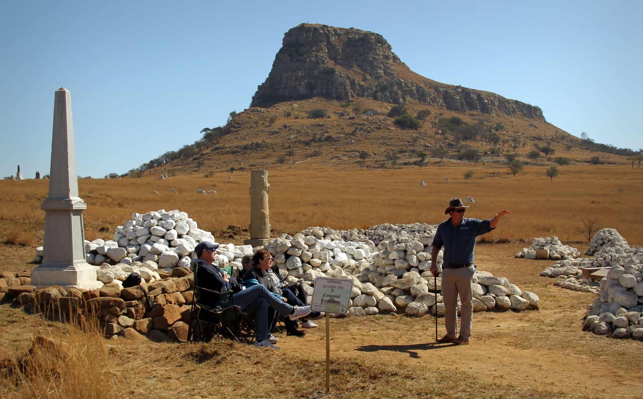 guide giving tour to guests at isandlwana