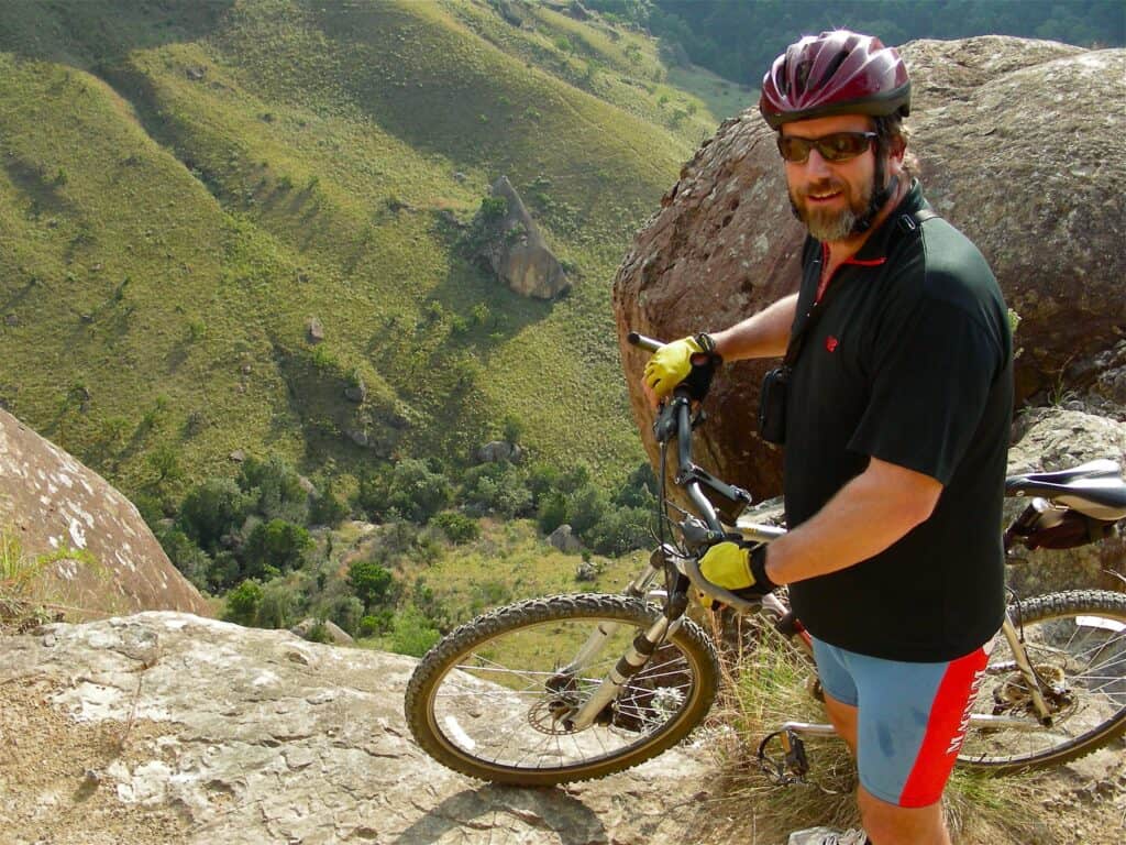 portrait of man with mountain bike