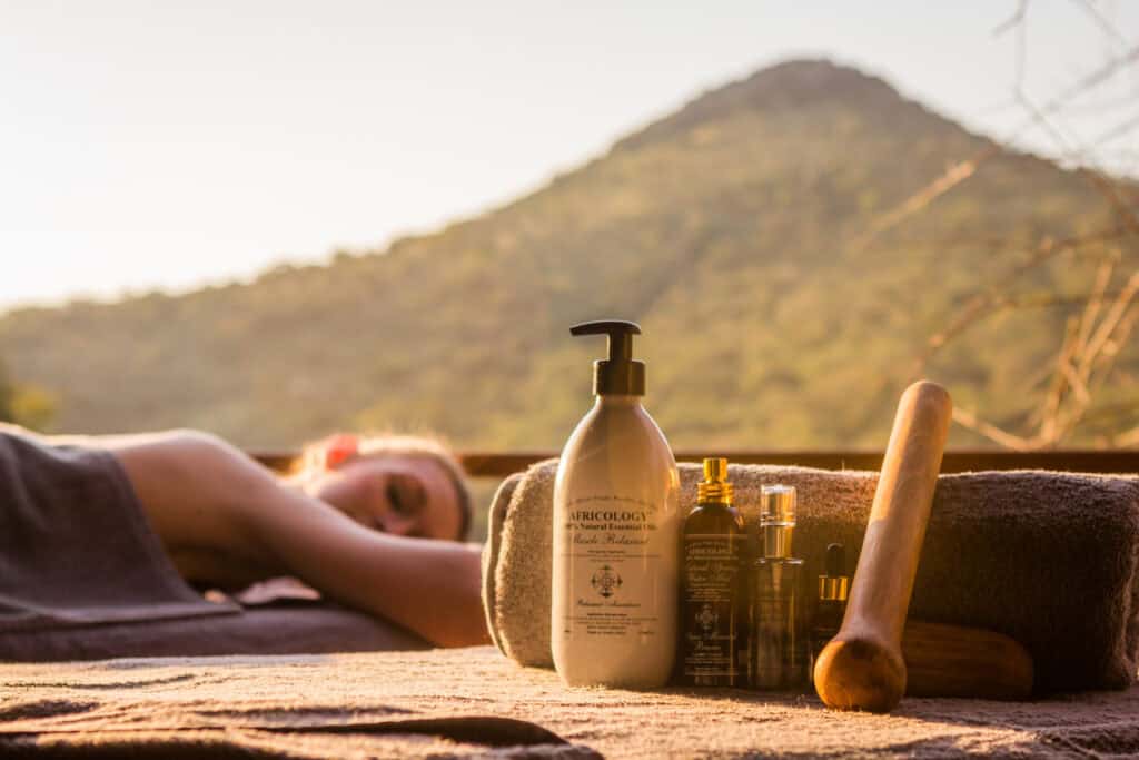 A relaxing massage therapy session using eco friendly Africology oils at the Leopard Mountain Safari Lodge clifftop wellness spa.